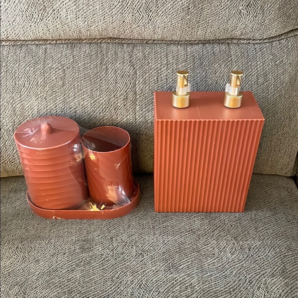 Terracotta Bathroom Set with Gold Pumps plastic material